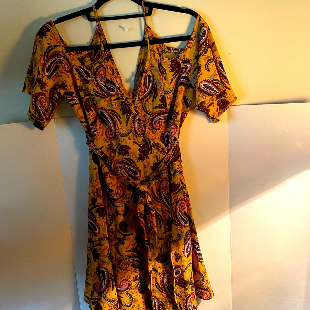“Rags to Wishes” open sholder top. Size Medium